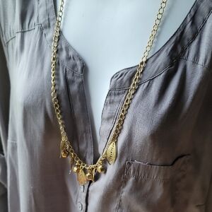 Elegant Gold Necklace with Charms